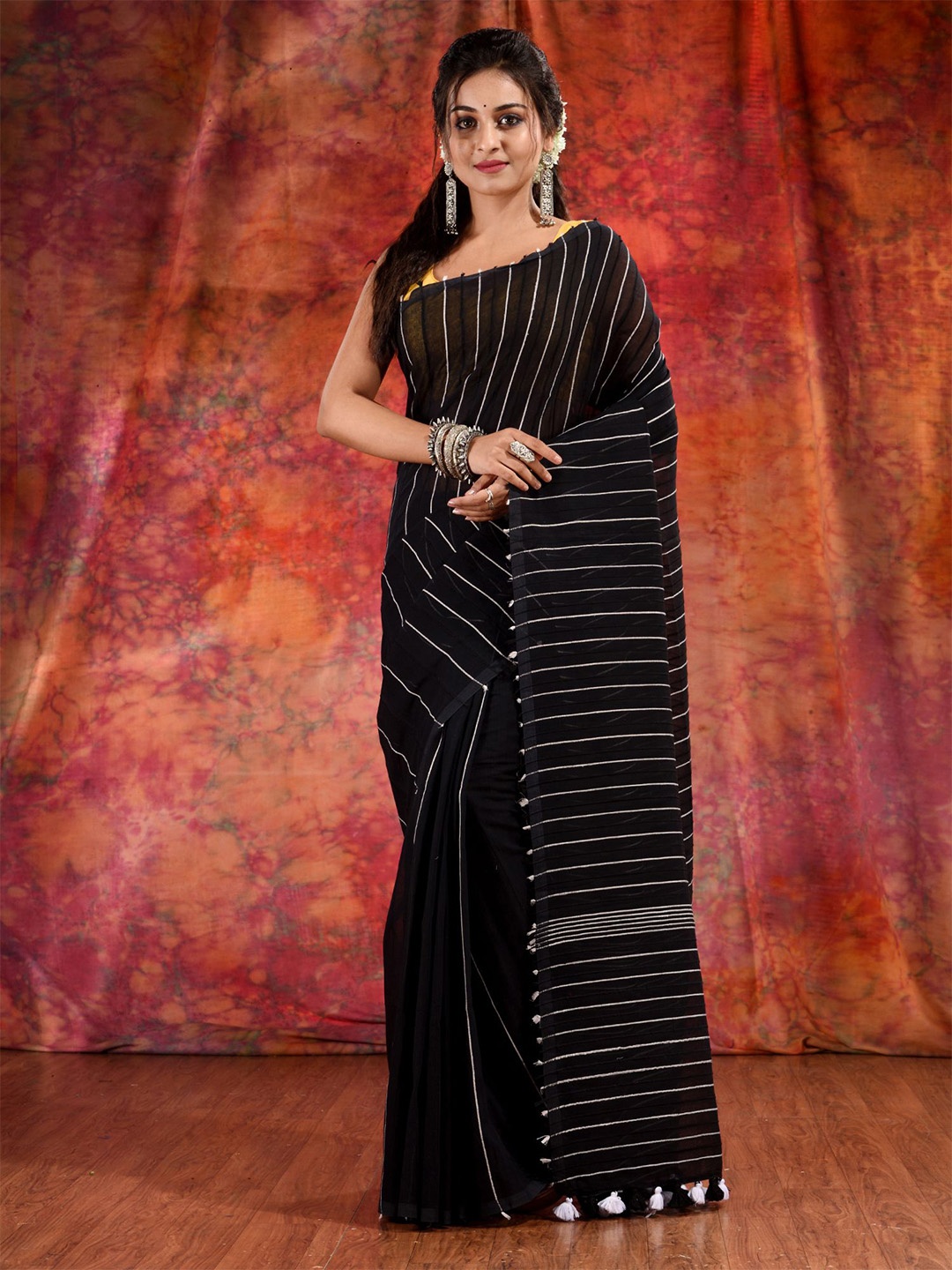 

Charukriti Black & Gold-Toned Striped Pure Cotton Saree