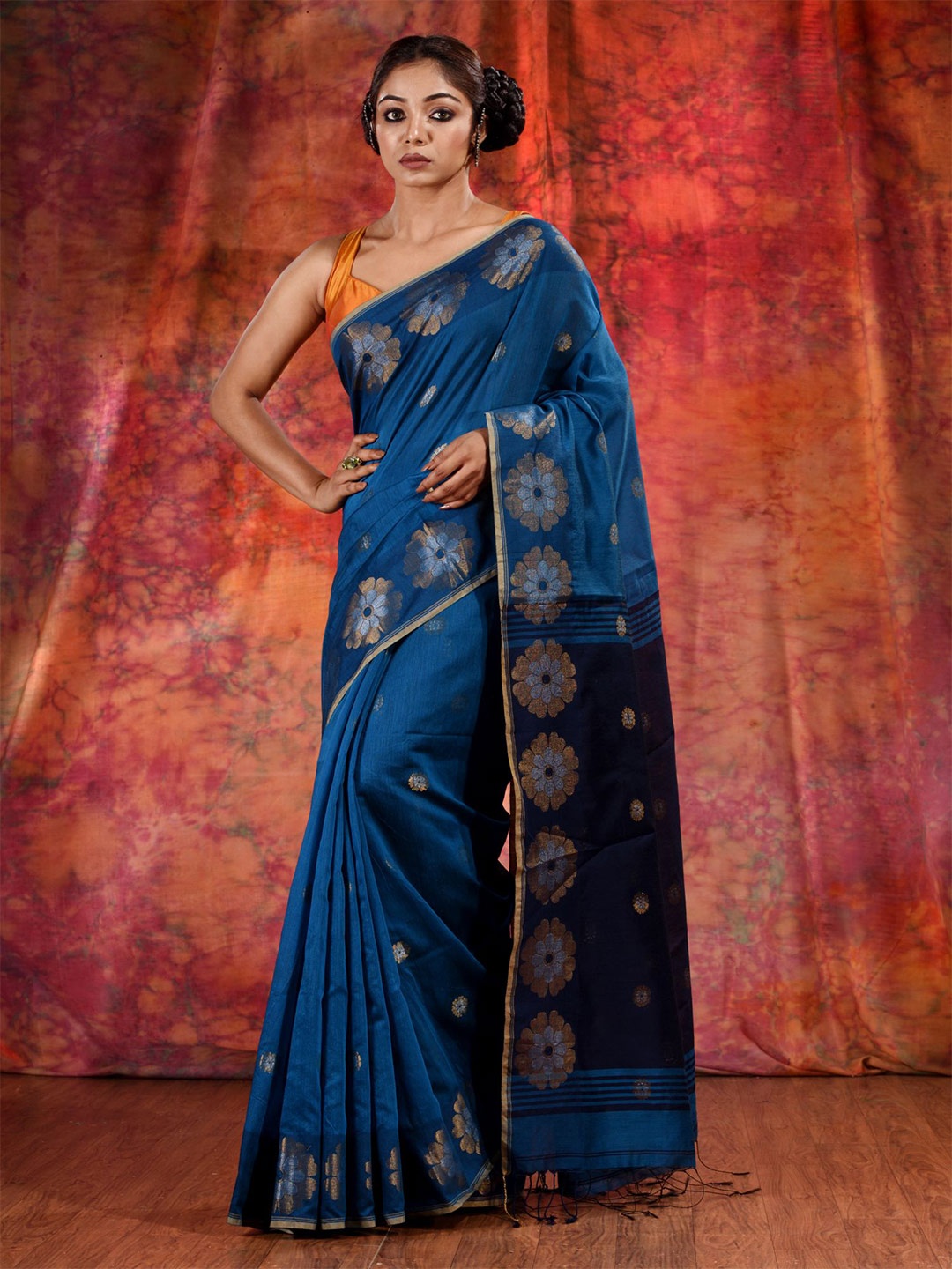 

Charukriti Women Blue & Gold-Toned Floral Zari Saree