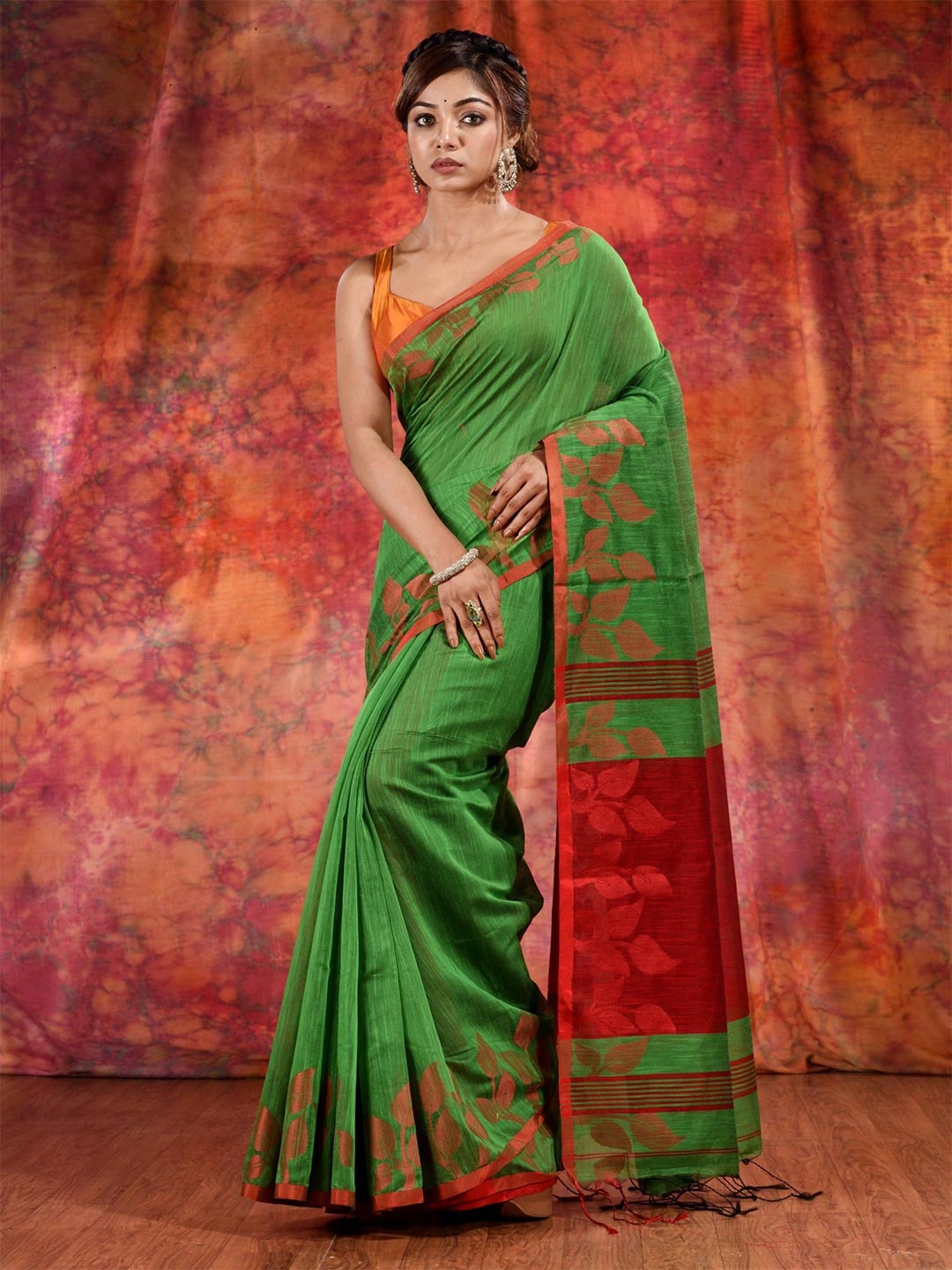 

Charukriti Green & Red Woven Design Saree