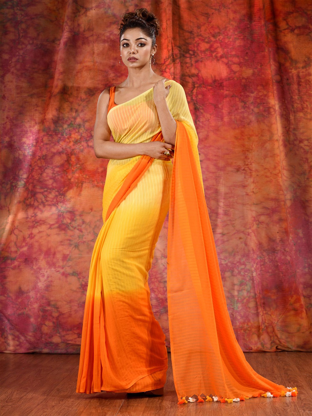 

Charukriti Yellow & Orange Striped Pure Cotton Saree