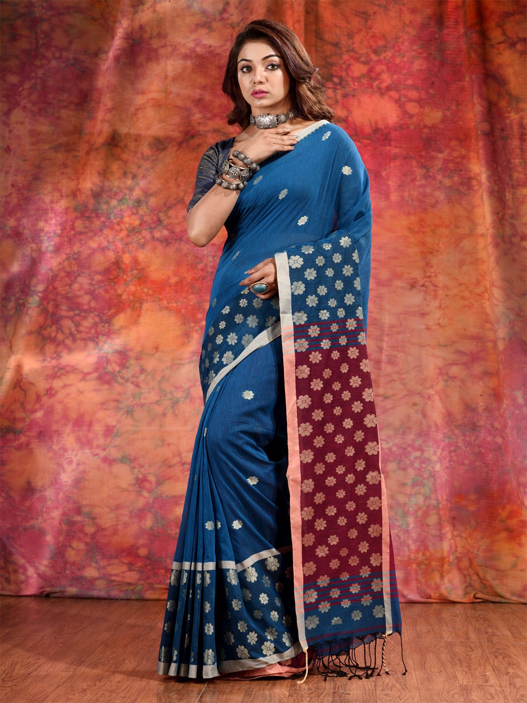 

Charukriti Teal & Maroon Woven Design Zari Pure Cotton Saree