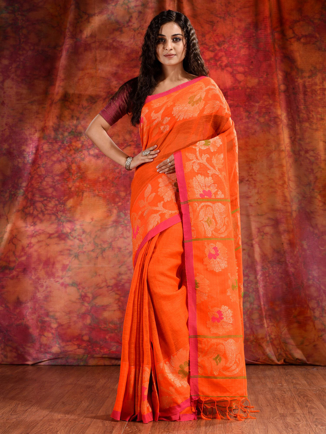 

Charukriti Orange & Gold-Toned Woven Design Pure Linen Saree