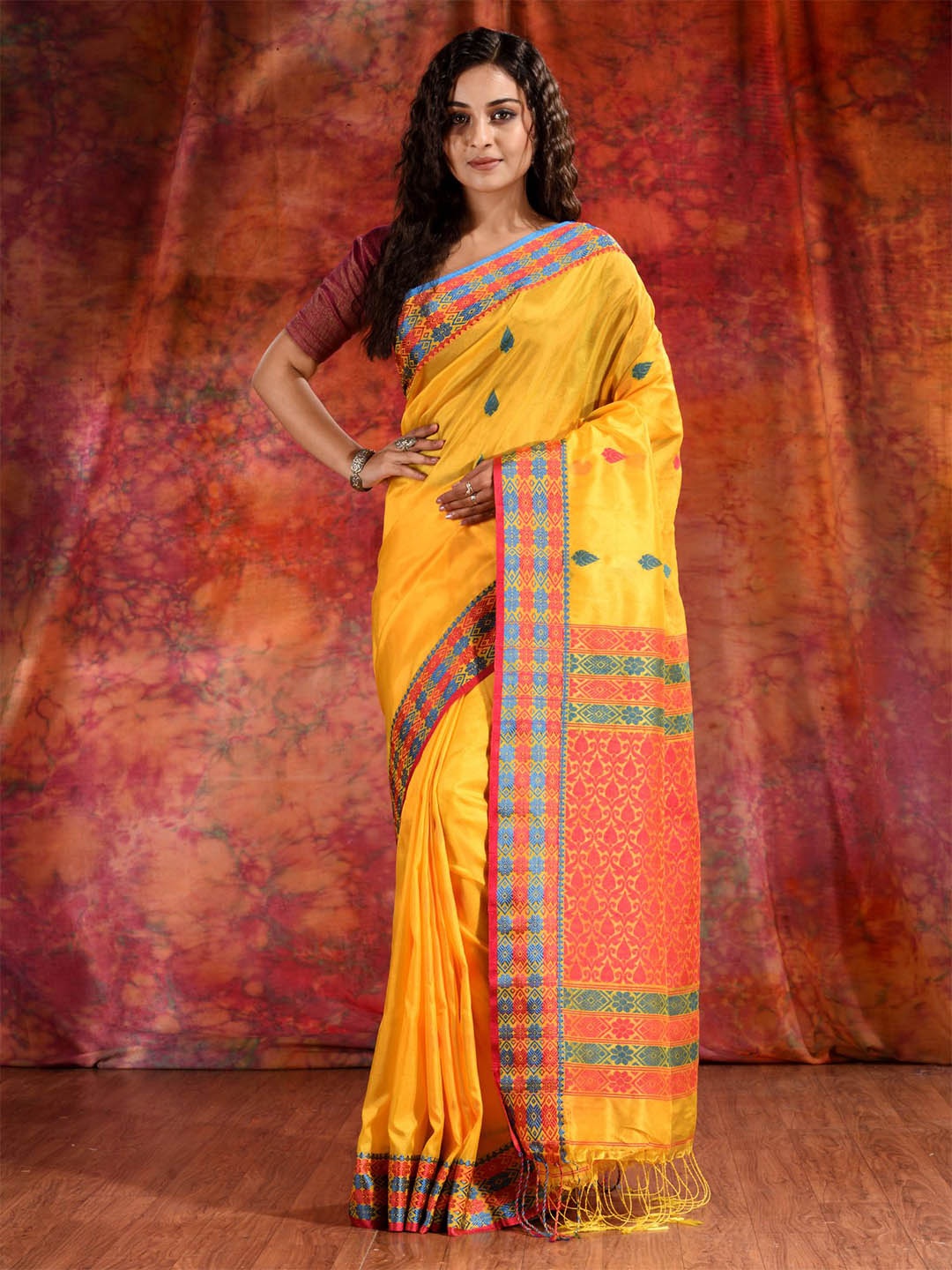

Charukriti Yellow & Pink Woven Design Silk Blend Saree