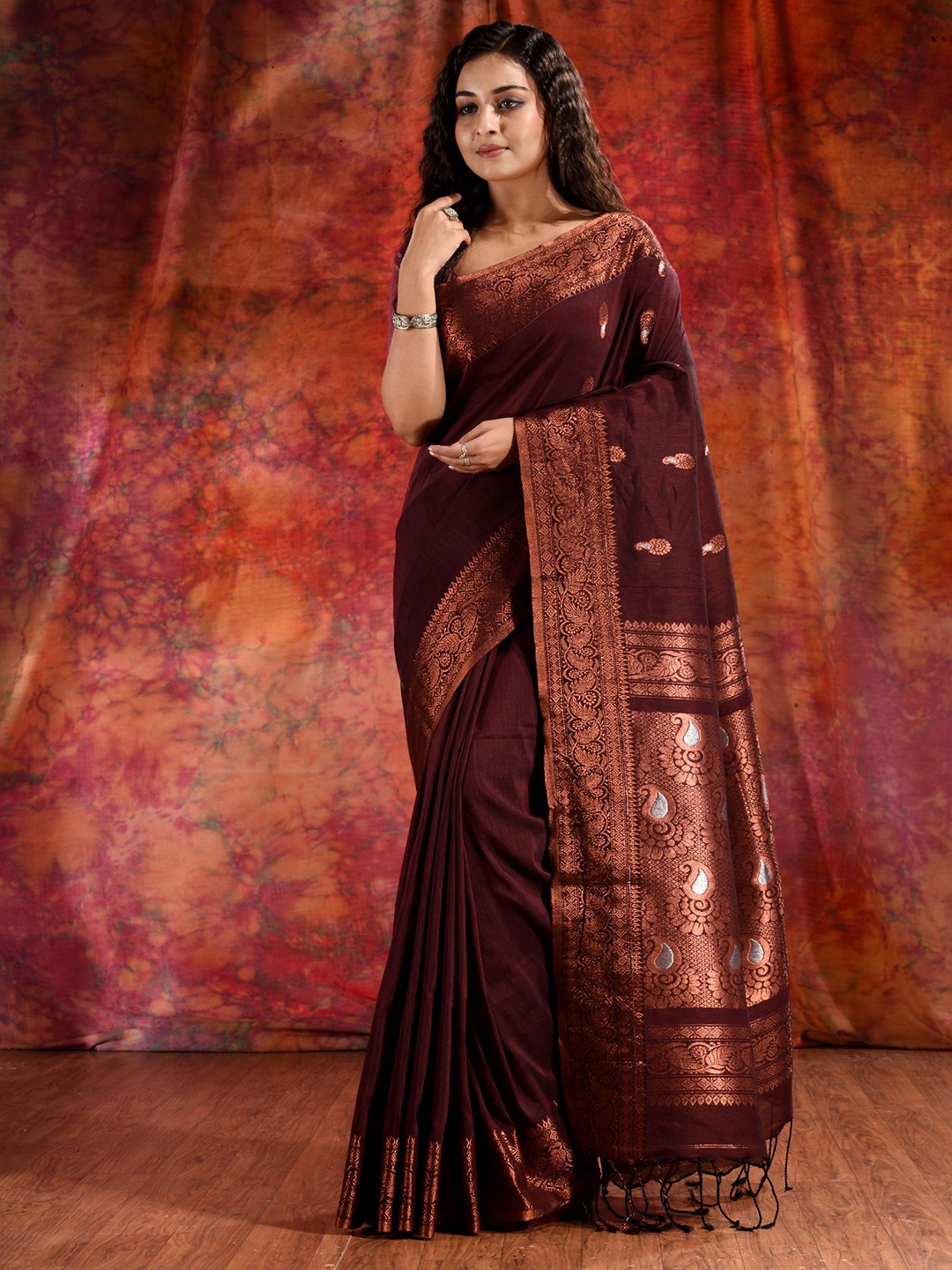 

Charukriti Maroon & Copper-Toned Woven Design Zari Pure Linen Saree