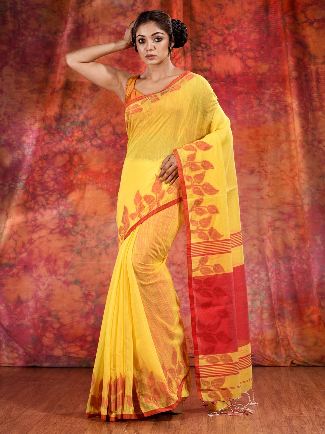 

Charukriti Women Yellow & Red Woven Design Saree