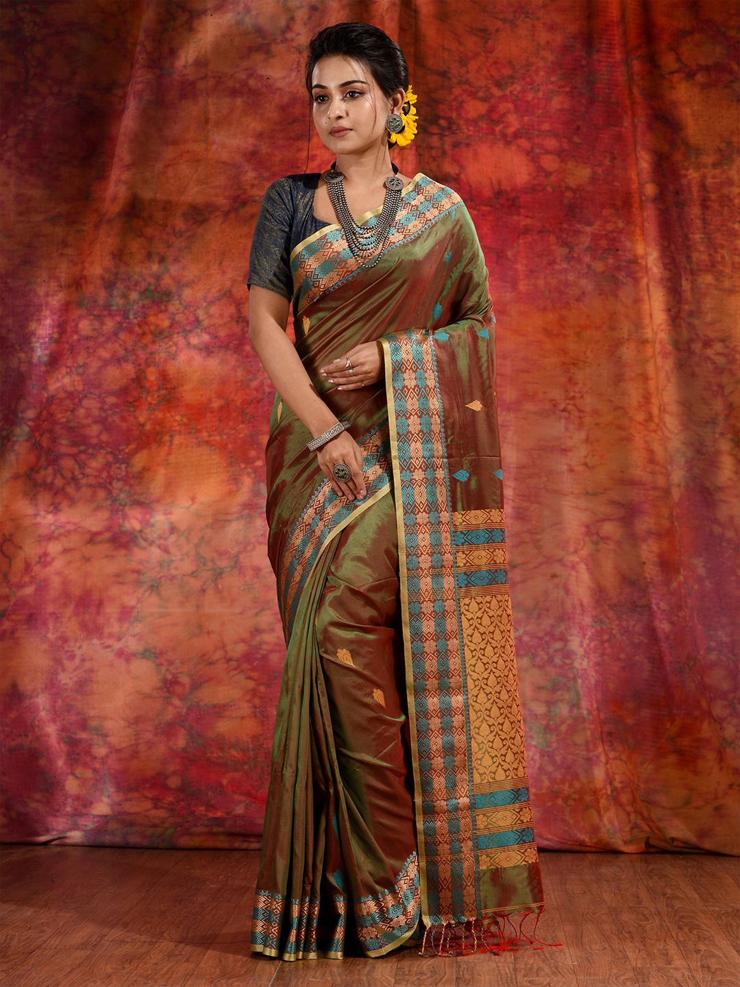 

Charukriti Green & Gold-Toned Woven Design Silk Blend Saree