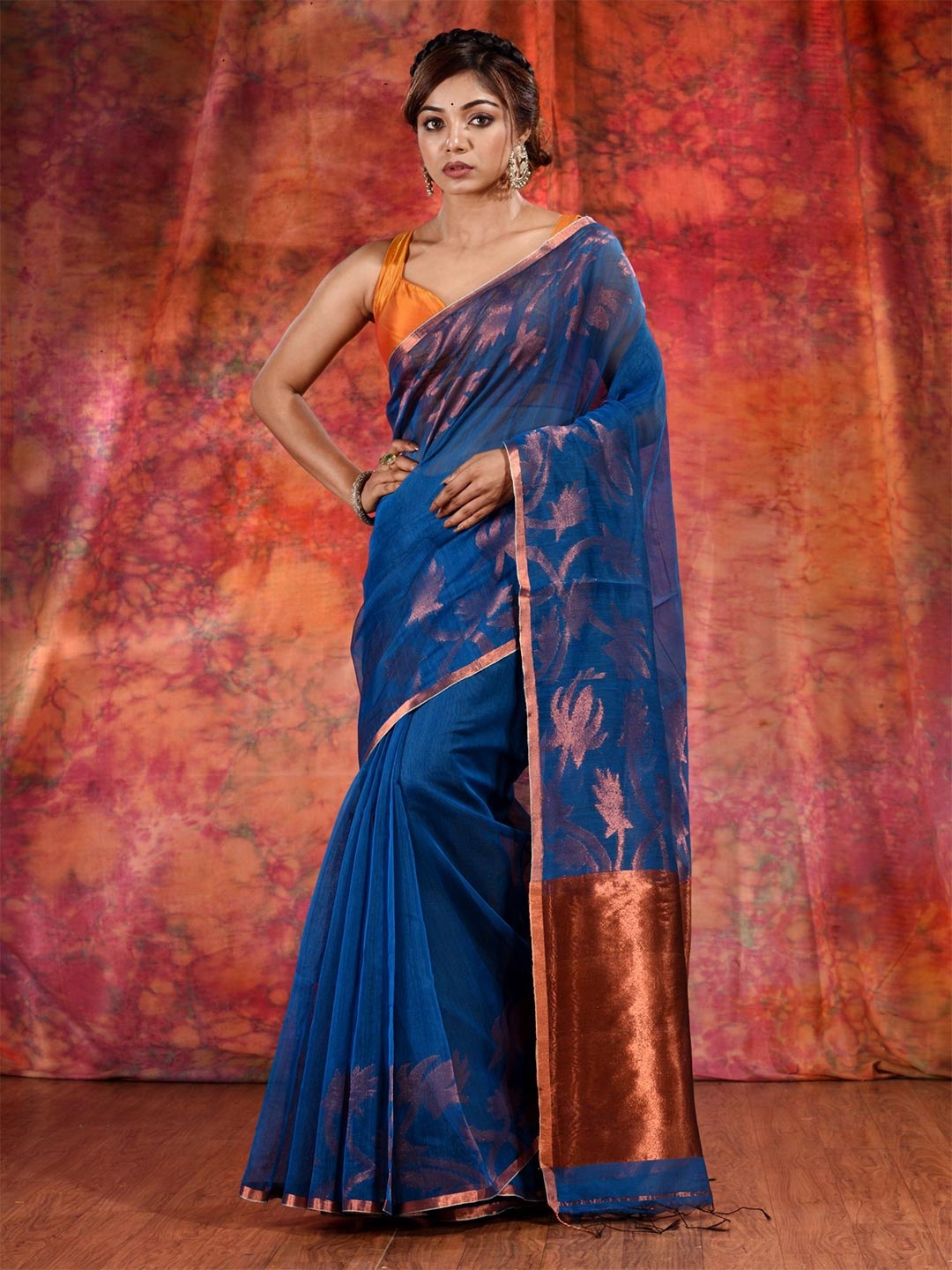 

Charukriti Blue & Gold-Toned Woven Design Zari Pure Cotton Saree