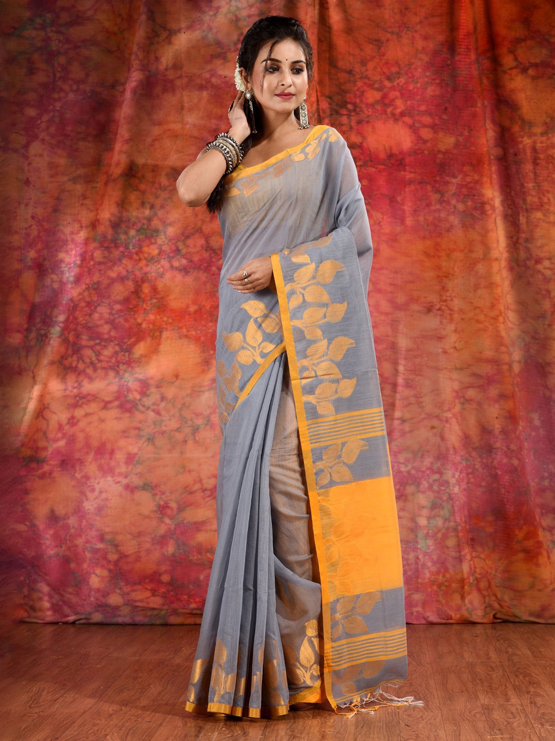 

Charukriti Grey Floral Saree