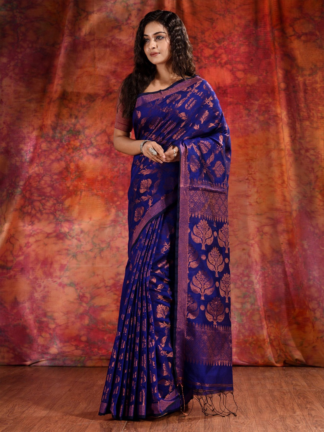 

Charukriti Women Blue & Gold-Toned Woven Design Zari Saree