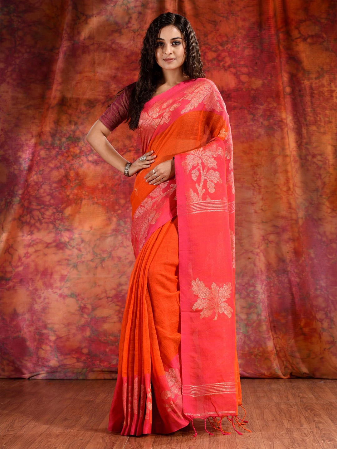 

Charukriti Orange & Gold-Toned Floral Pure Linen Saree