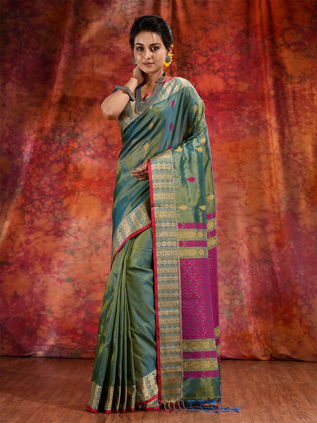 

Charukriti Green & Pink Ethnic Motifs Zari Silk Blend Saree