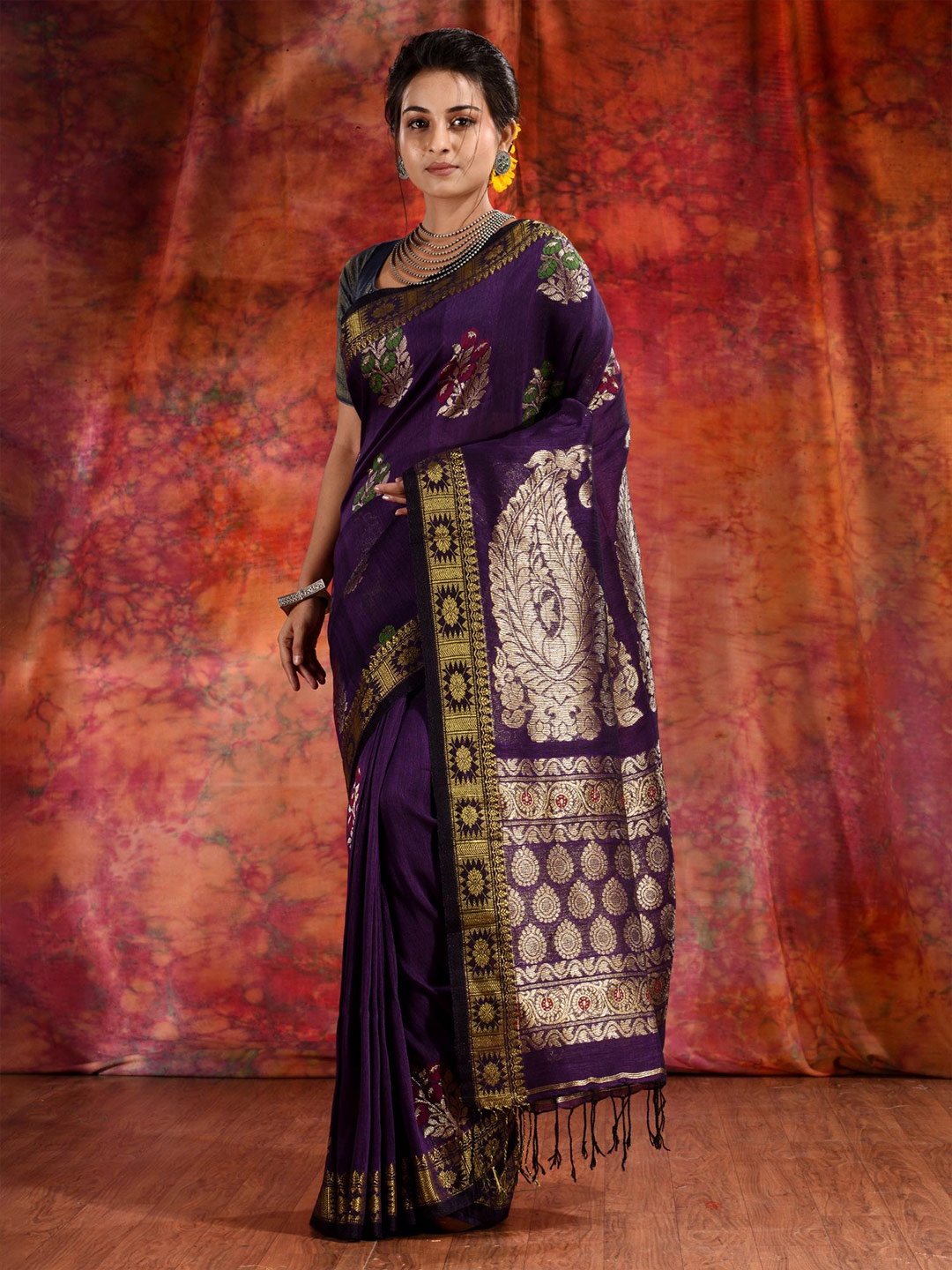 

Charukriti Women Purple & Gold-Toned Woven Design Zari Pure Linen Saree