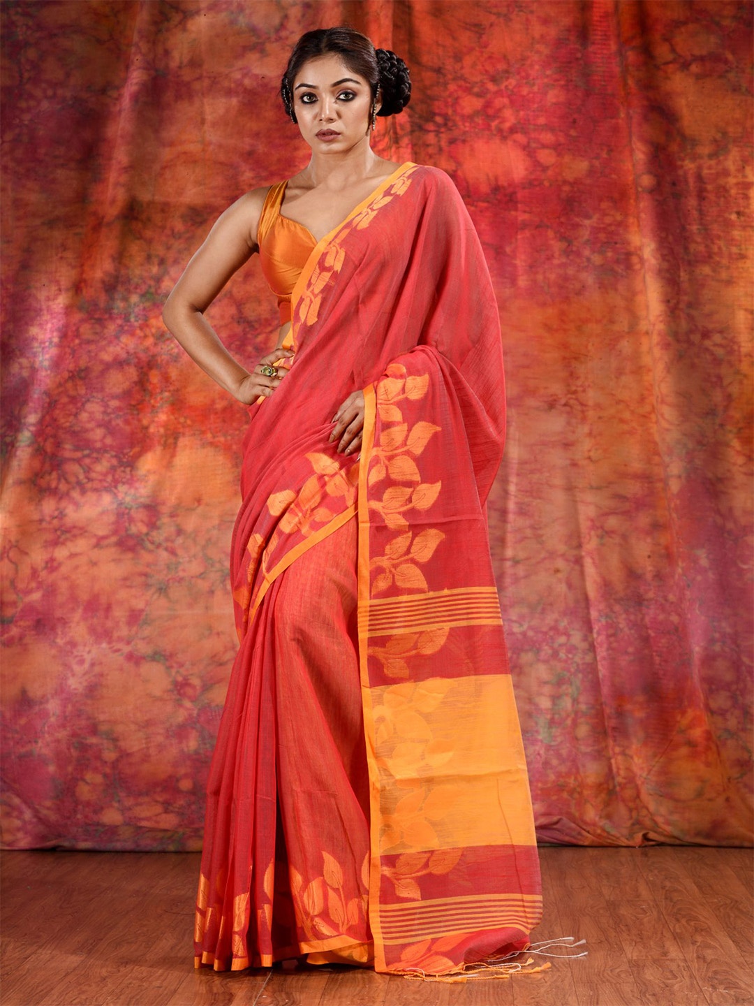 

Charukriti Red & Yellow Floral Saree