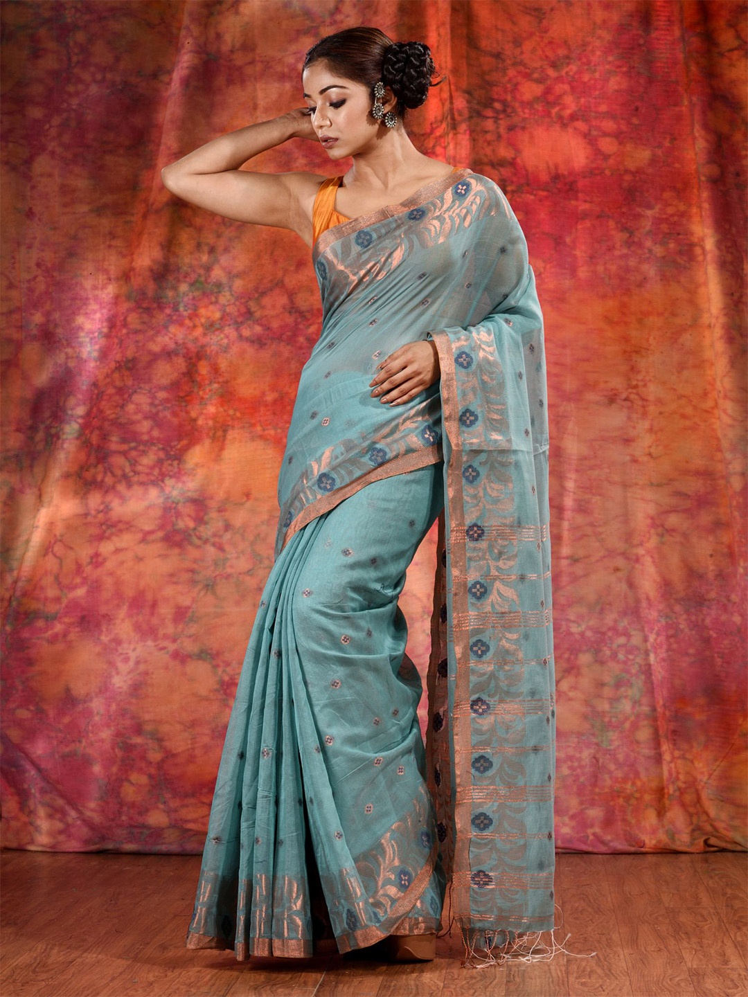 

Charukriti Women Green & Gold Toned Ethnic Motifs Zari Saree