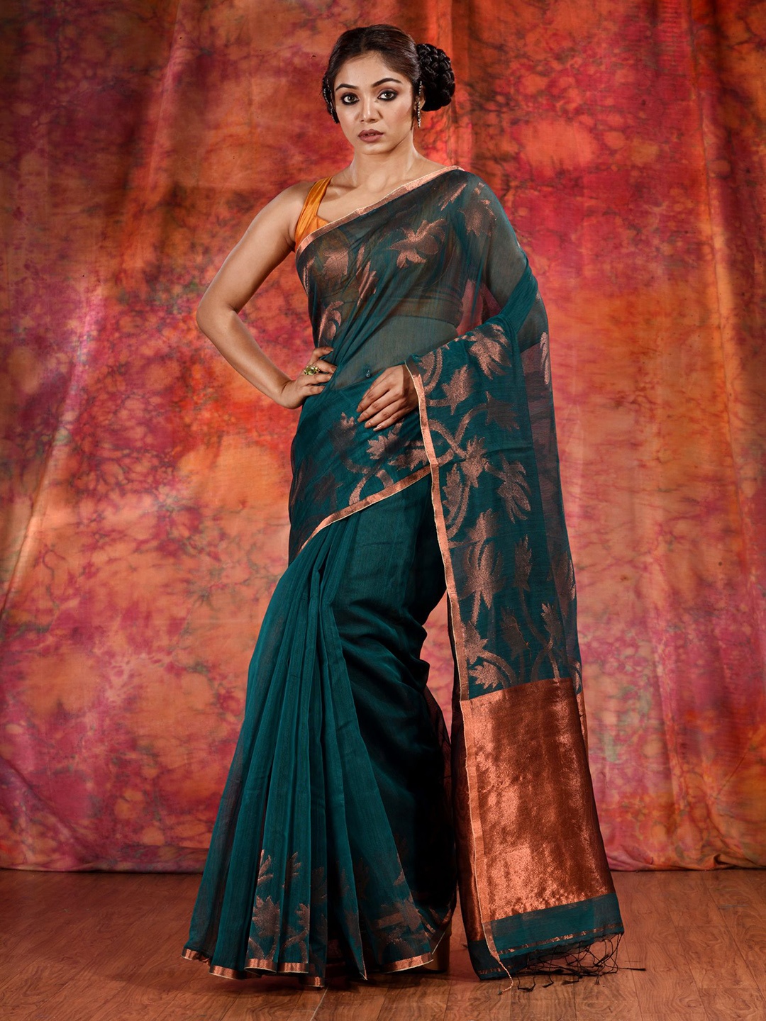 

Charukriti Green & Copper-Toned Woven Design Zari Pure Cotton Saree
