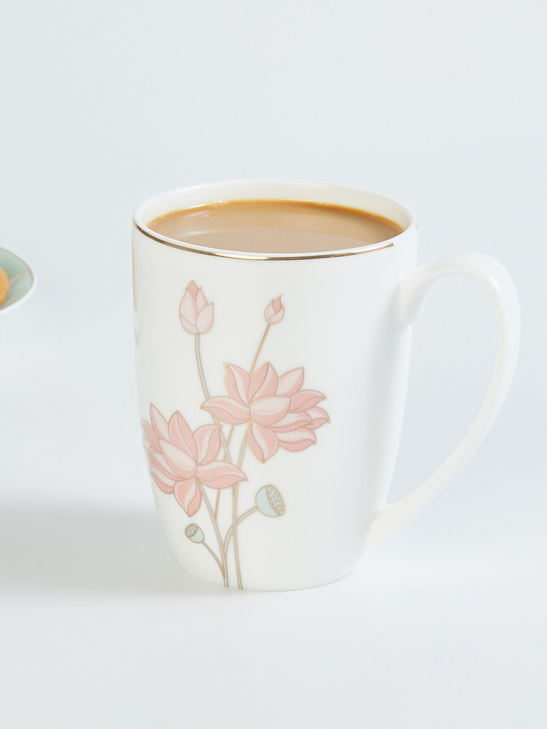 

Home Centre White & Peach-Coloured Printed Bone China Glossy Mugs Set of Cups and Mugs