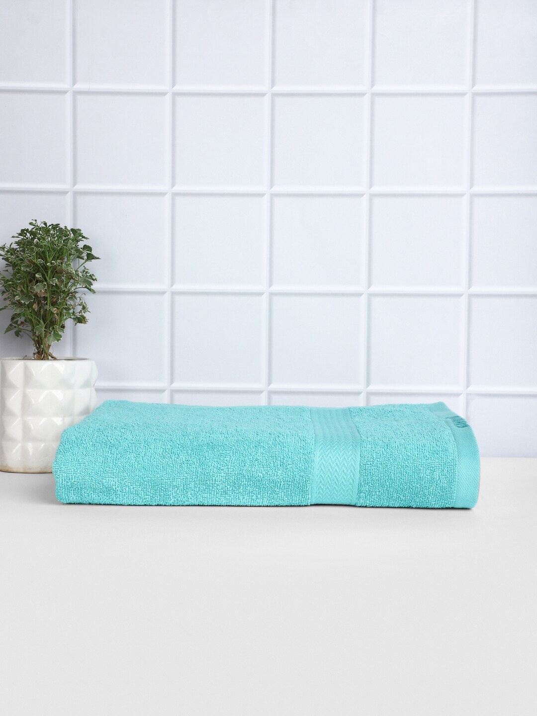 

Raymond Home Turquoise Blue Solid 380 GSM Pure Cotton Bath Towel