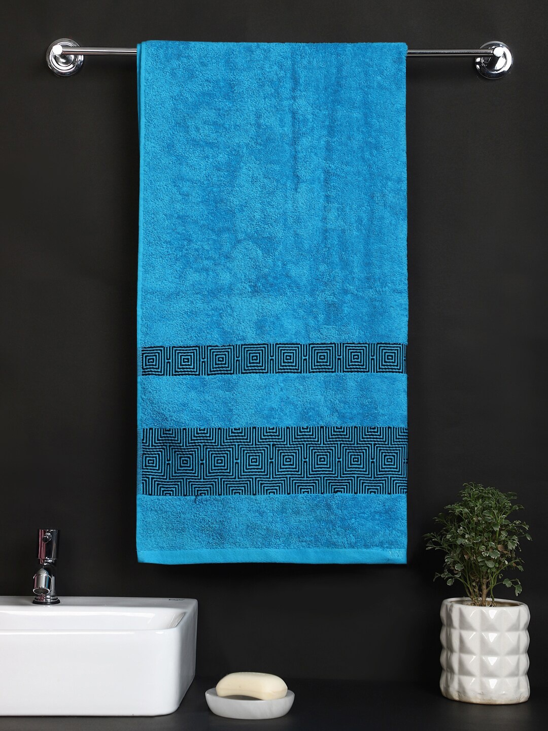 

Raymond Home Blue Solid 440 GSM Pure Cotton Bath Towels