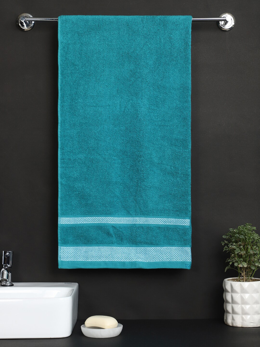 

Raymond Home Blue Solid 380 GSM Pure Cotton Bath Towels