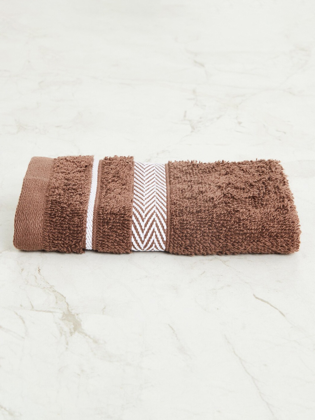 

Home Centre Colour Connect-Essence Brown Textured Cotton Face Towel - 30x30cm