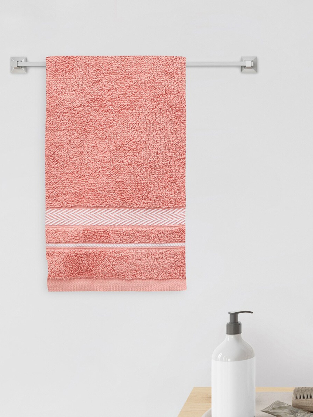 

Home Centre Colour Connect Essence Peach Textured Cotton Hand Towel