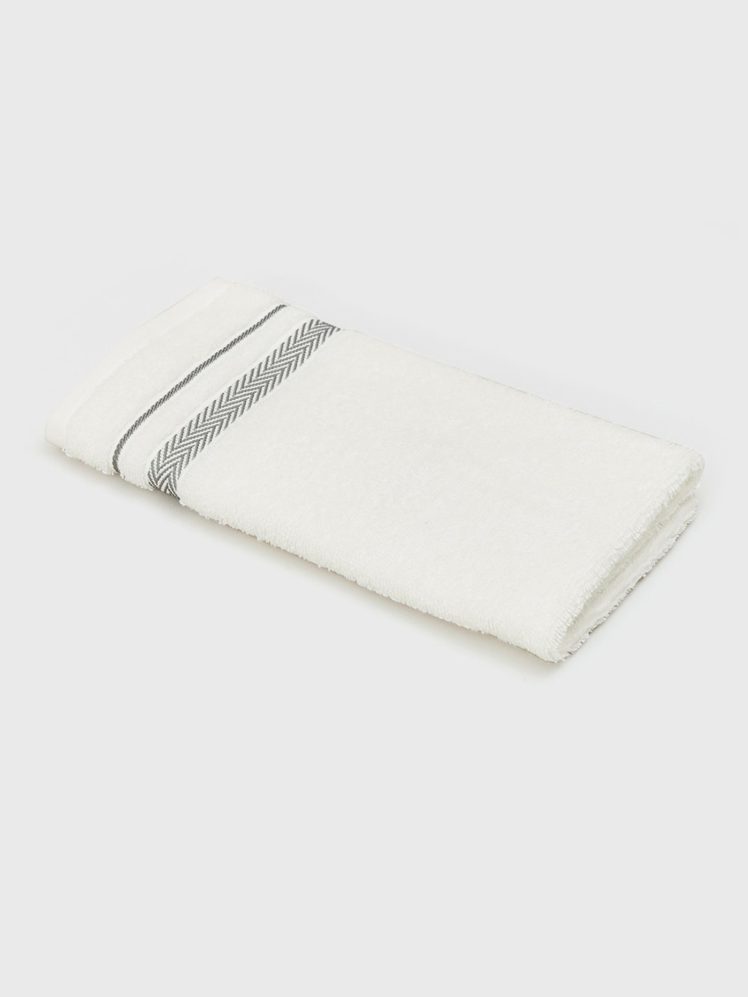 

Home Centre Colour Connect-Essence White Textured Cotton Hand Towel