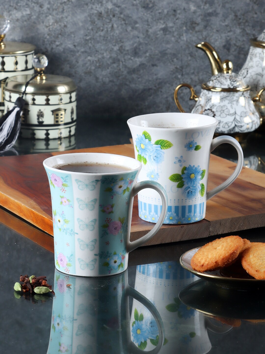 

ceradeco White And Blue Set Of 2 Floral Printed Ceramic Glossy Mugs 300 ML Each, Assorted