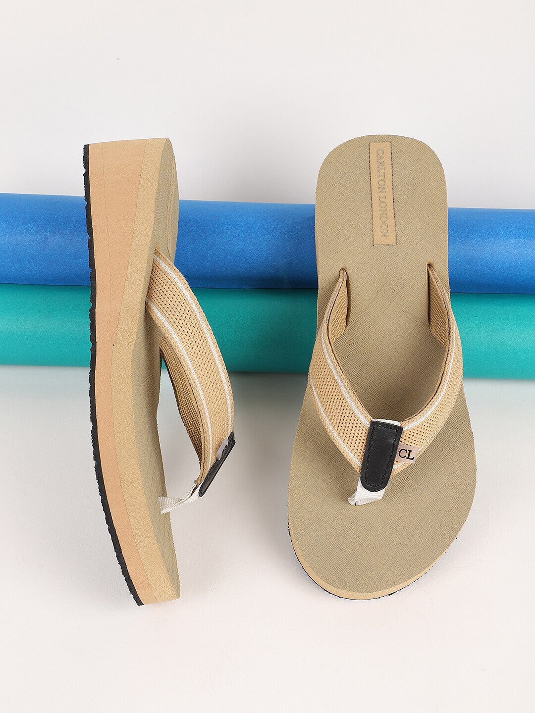 

Carlton London Women Beige & Black Embellished Rubber Thong Flip-Flops