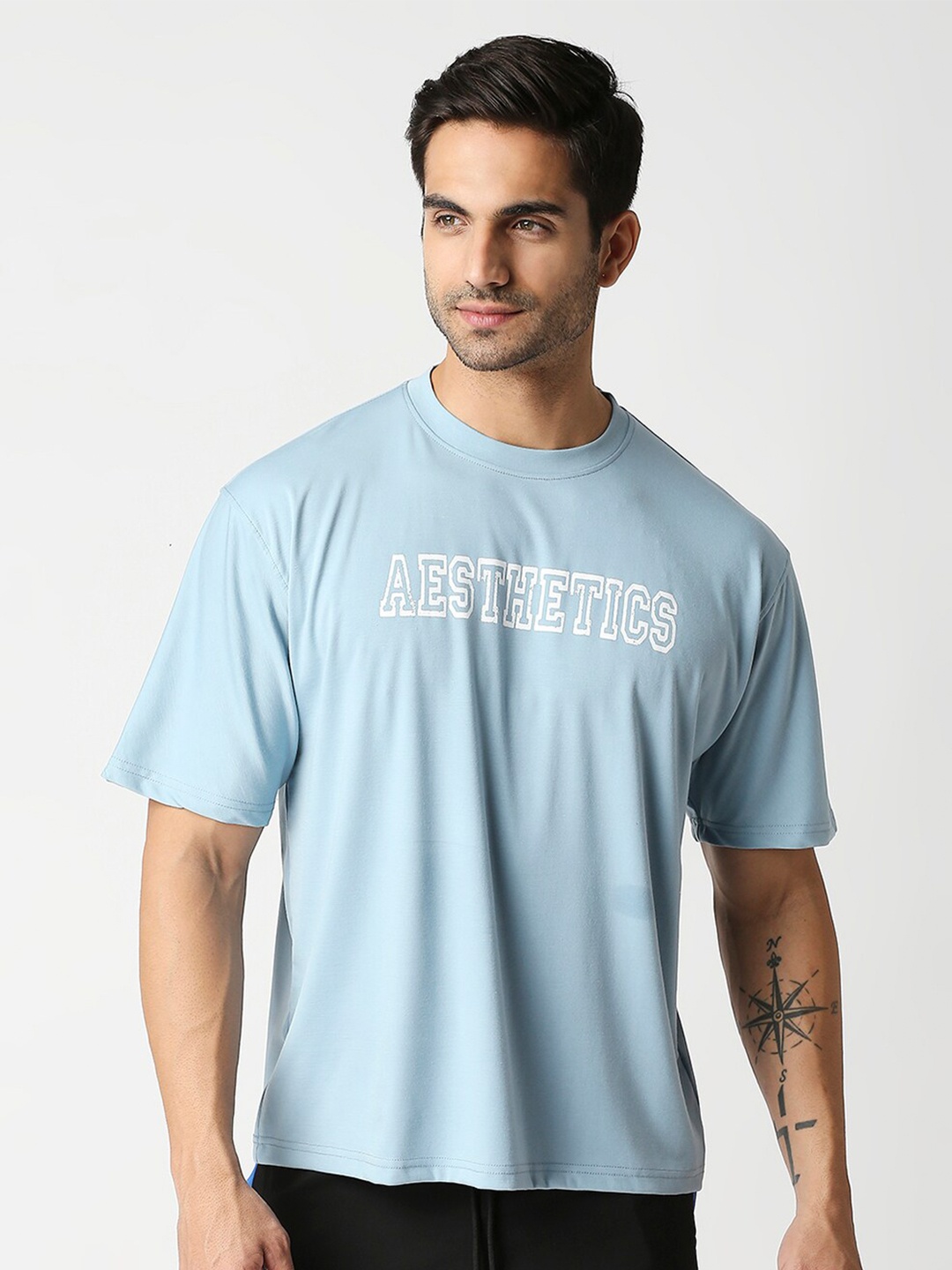 

AESTHETIC NATION Men Typography Printed Tencel Oversize T-shirt, Blue