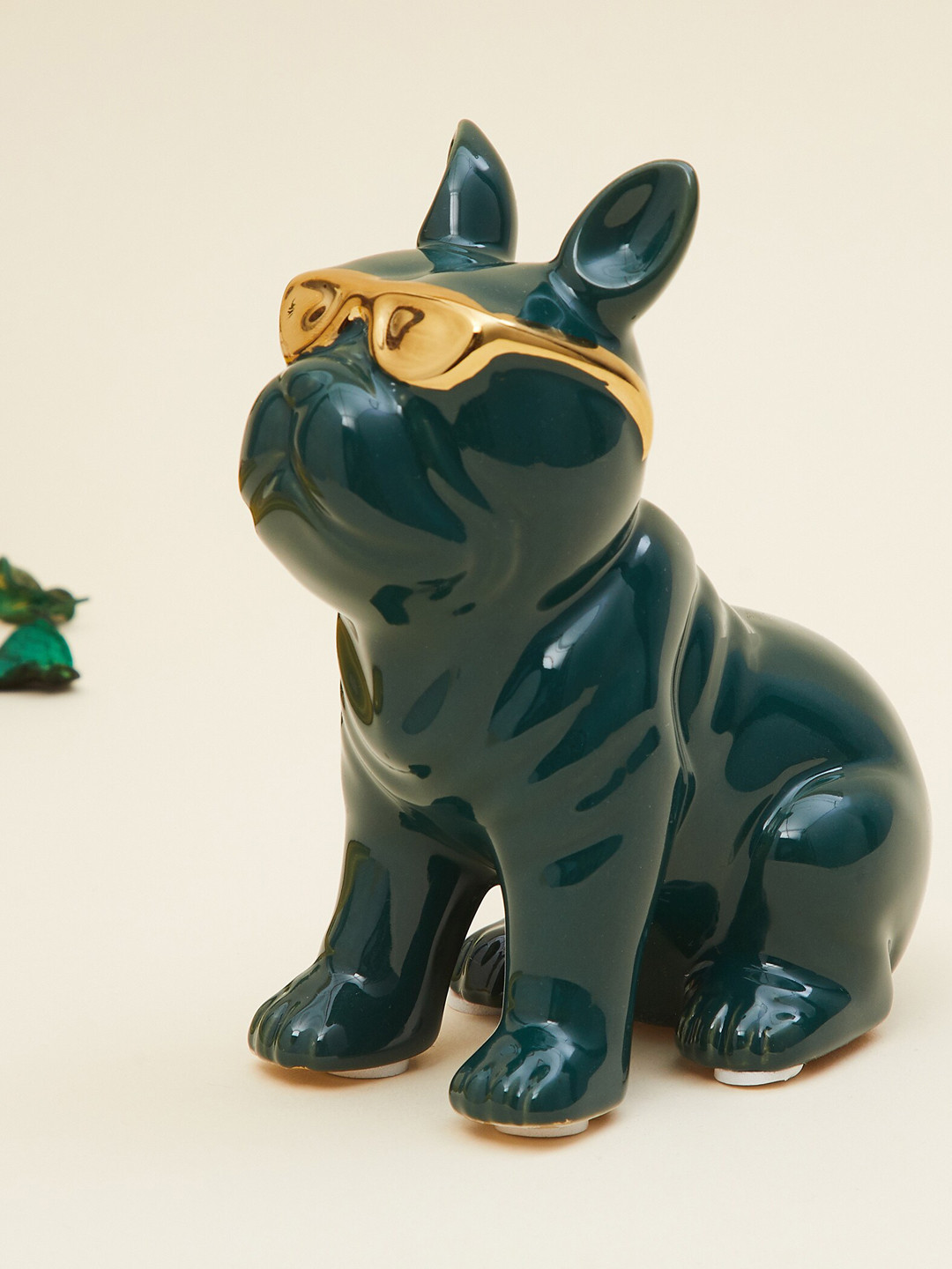 

Home Centre Gold-Toned & Green Solid Ceramic Sitting Dog Figurine Showpieces