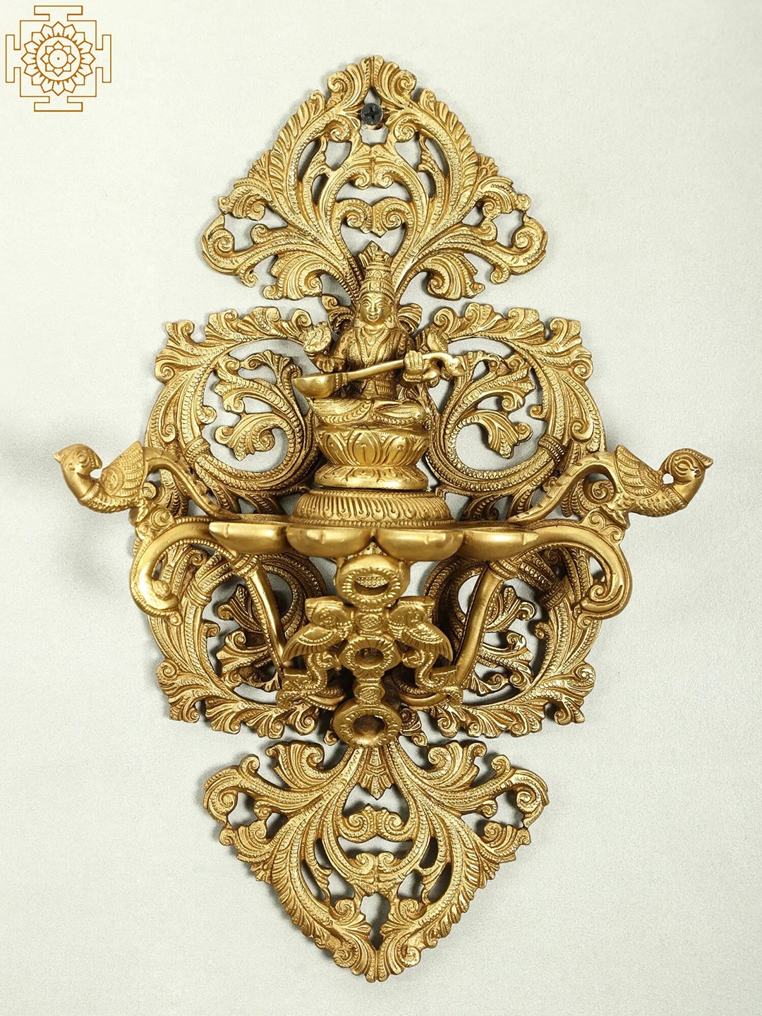 

Exotic India Gold-Toned Goddess Saraswati Wall Hanging Brass Diya