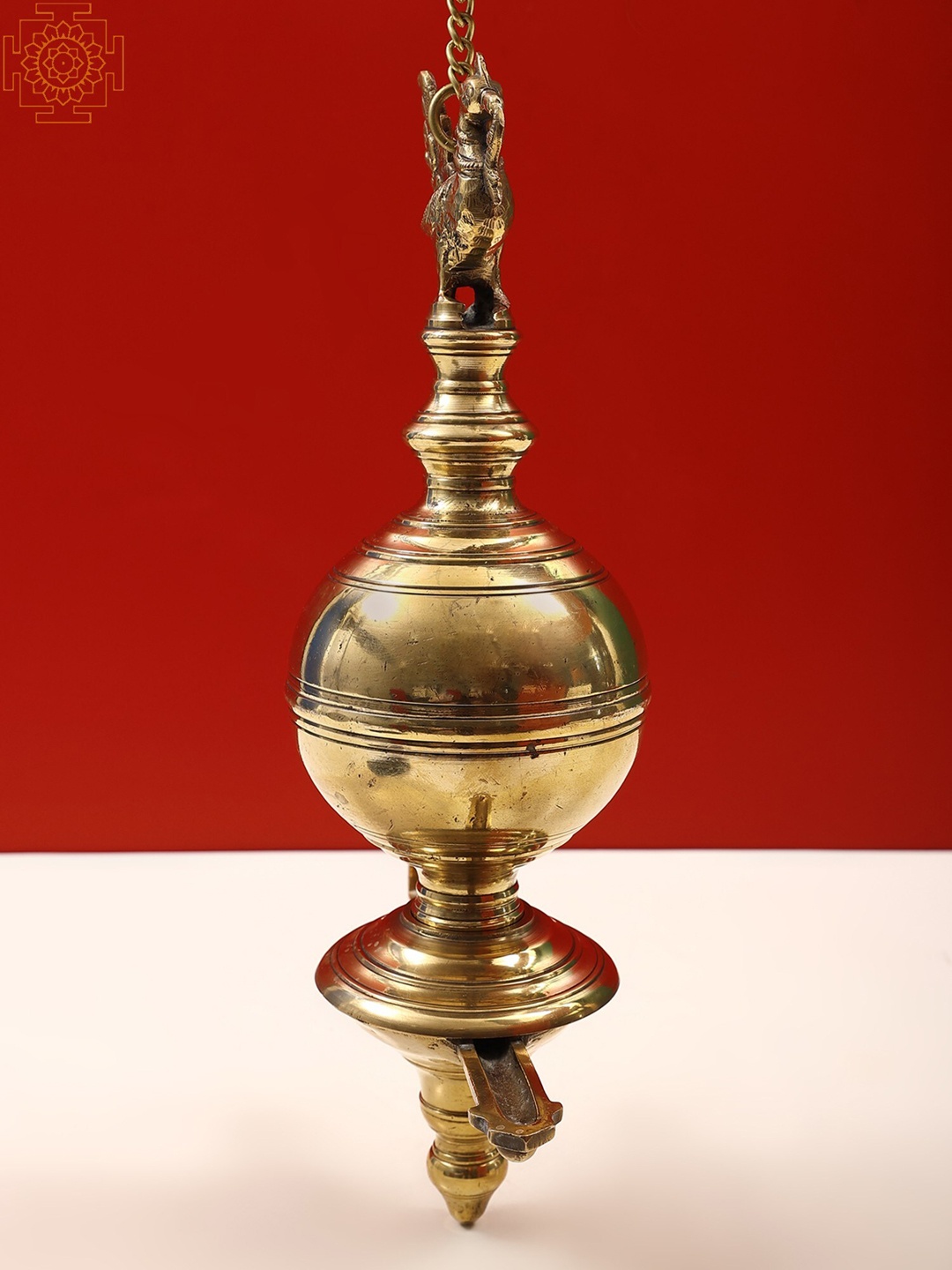 

Exotic India 16" Brass Peacock Hanging Diya, Gold