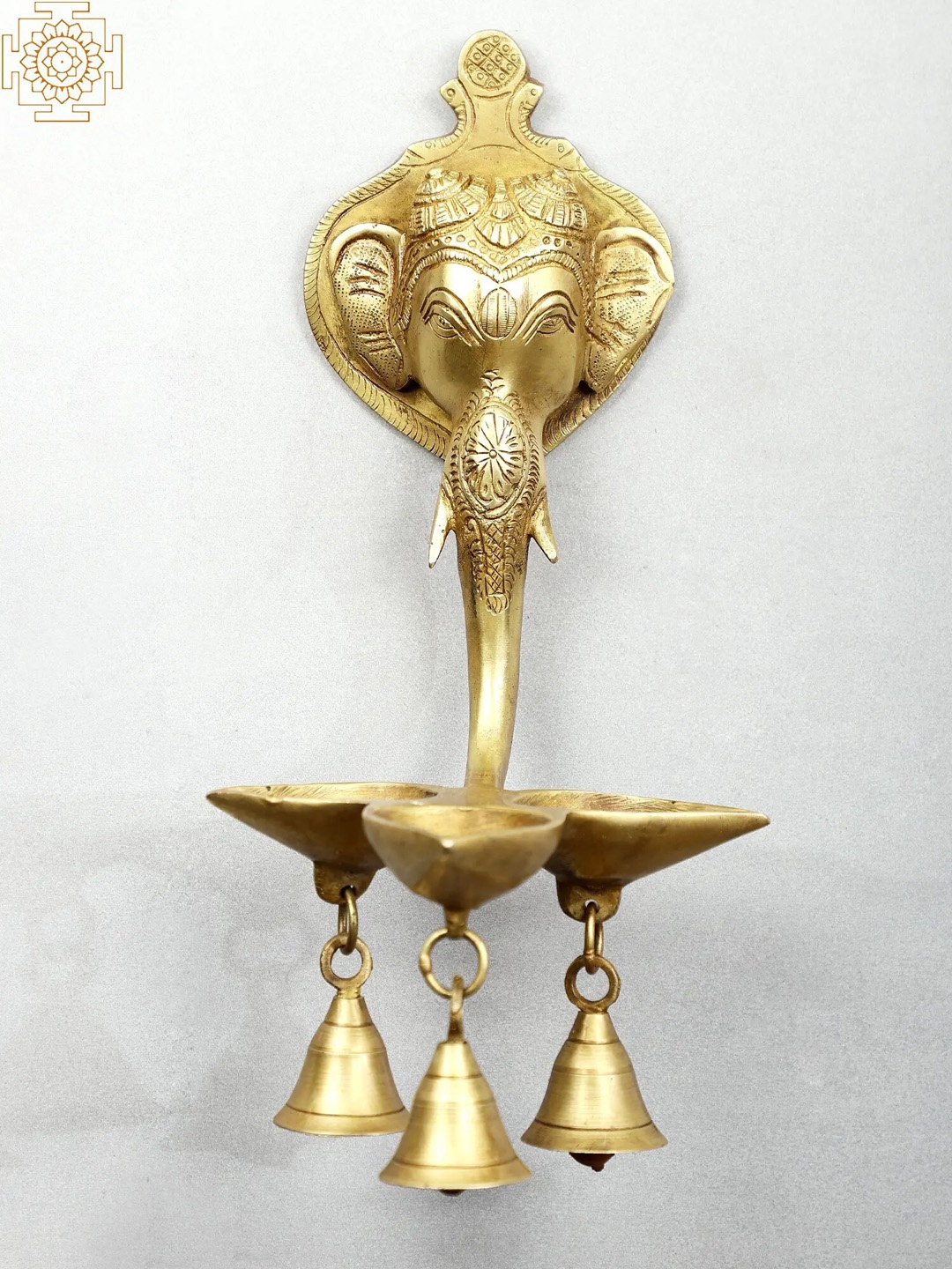 

Exotic India Gold-Toned Brass Lord Ganesha Wall Hanging Diya With Bells