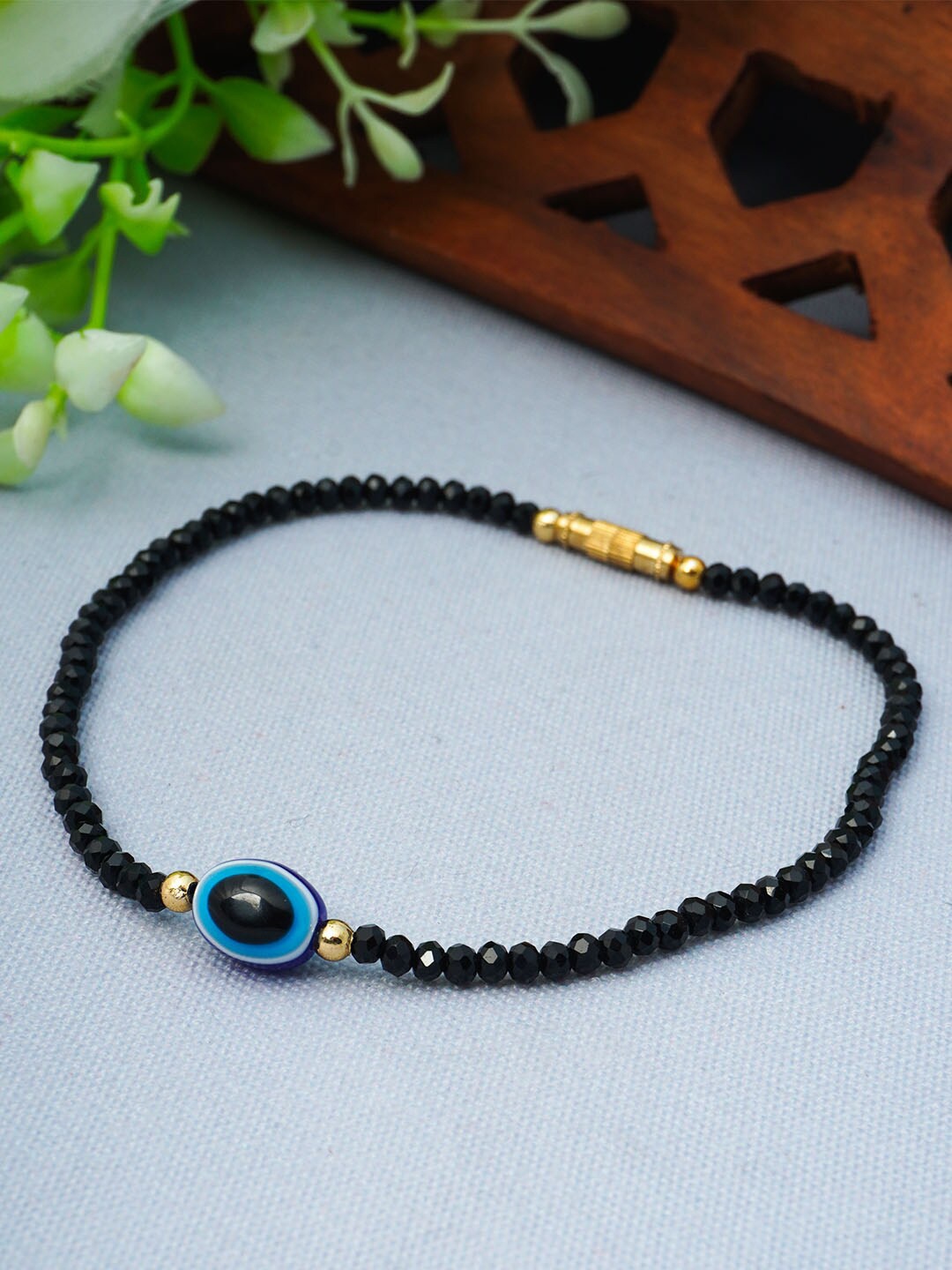 

Urmika Women Single Black Beaded Evil Eye Anklet