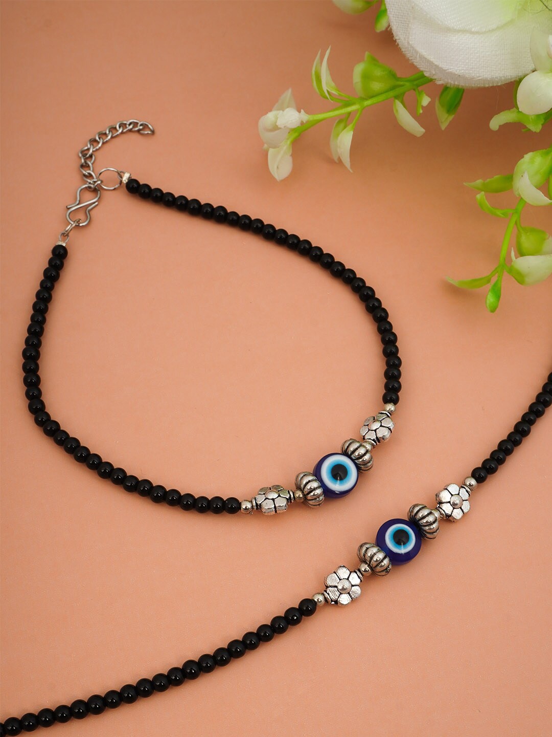 

Urmika Set Of 2 Black Beaded & Silver Evil Eye Anklet