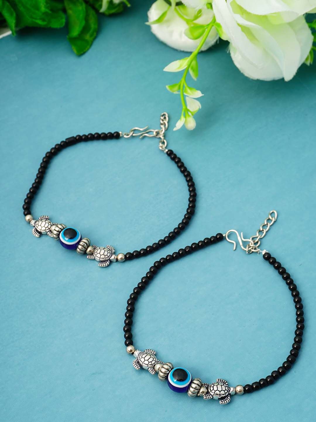 

Urmika Women Black & Silver-Toned Set Of 2 Beaded Evil Eye Enameled Anklets