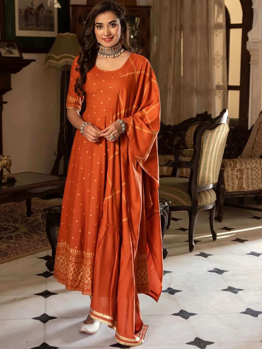 

Rustorange Women Rust & Gold-Toned Printed Flared Gotta Patti Kurta With Dupatta