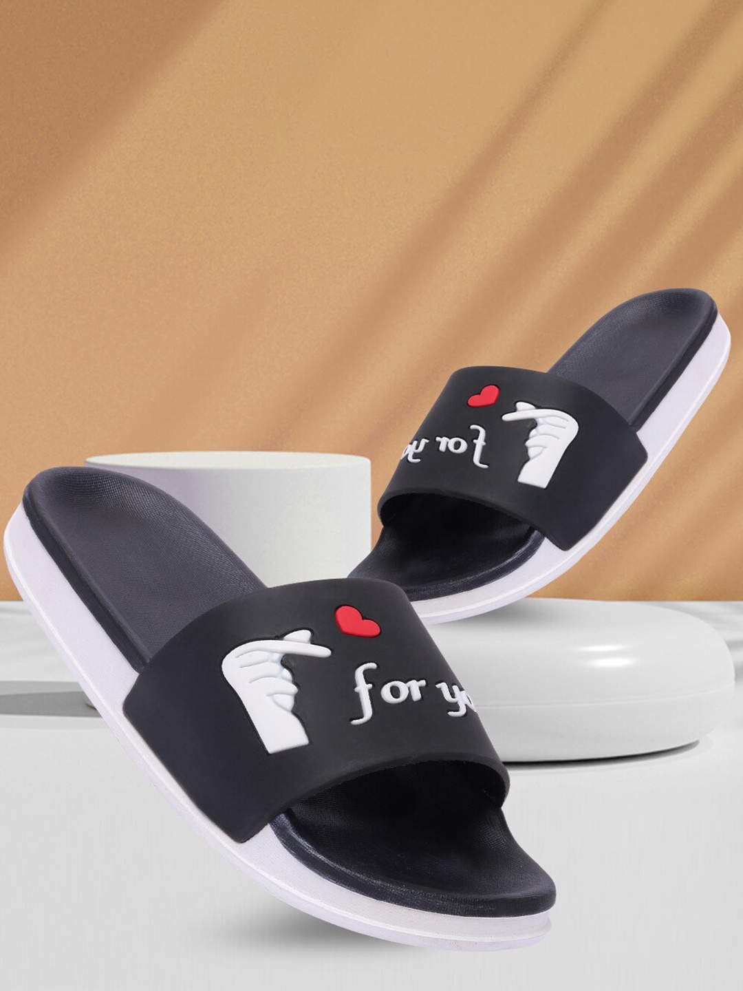 

Longwalk Women Black & White Rubber Sliders