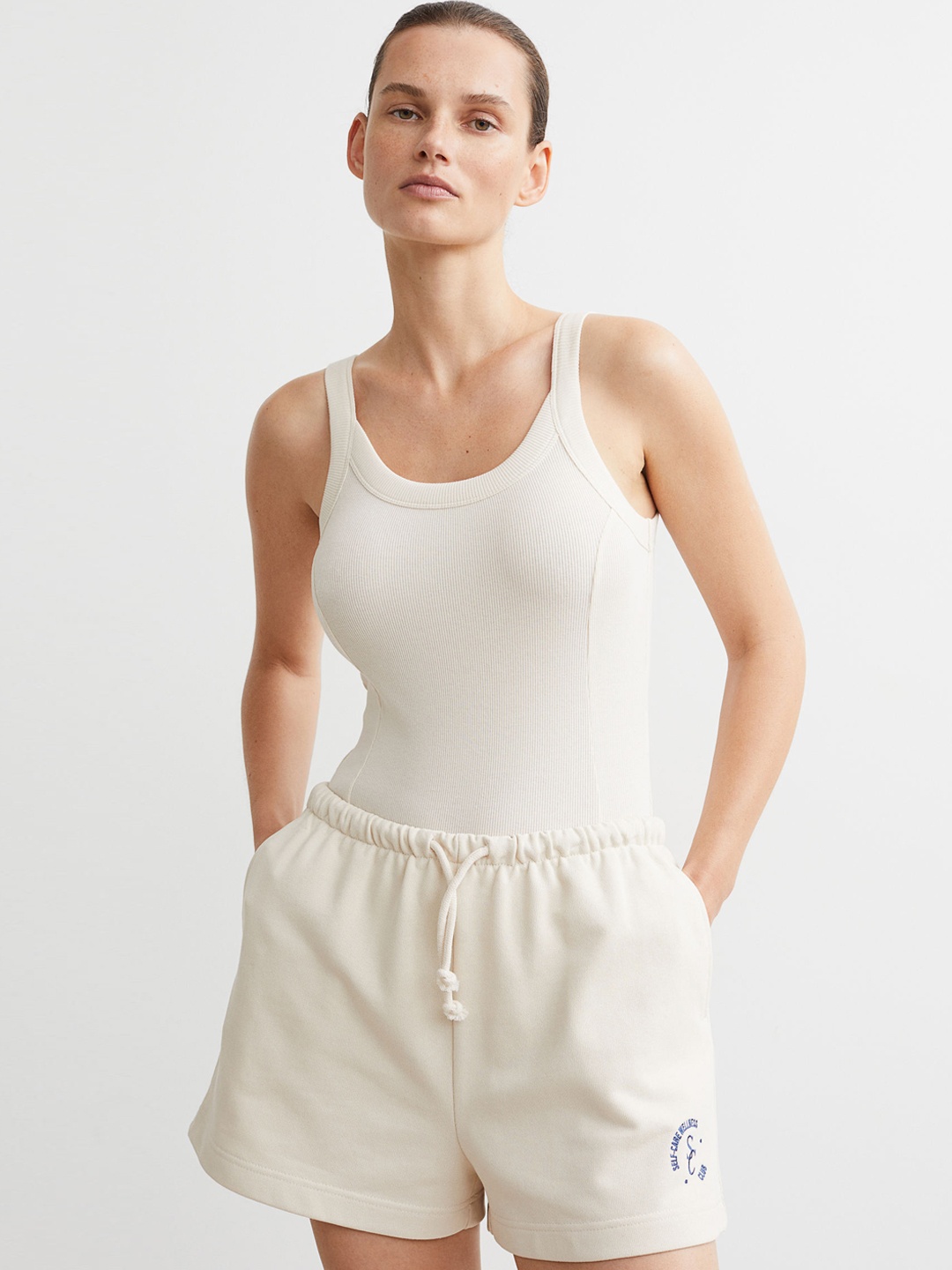 

H&M Women Beige Solid Ribbed Bodysuit