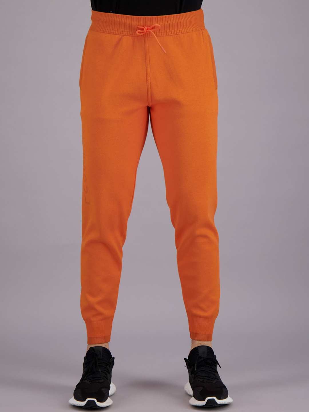 

FREESOUL Men Orange Colored Solid Joggers