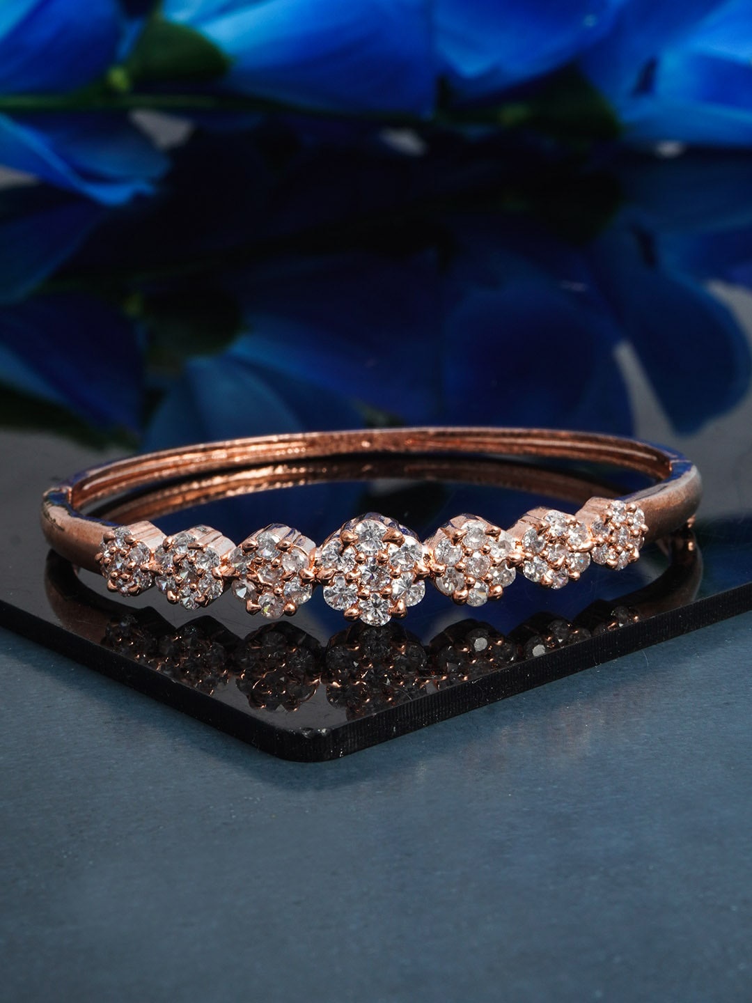 

Urmika Women Rose Gold Plated Floral Cuff Bracelet