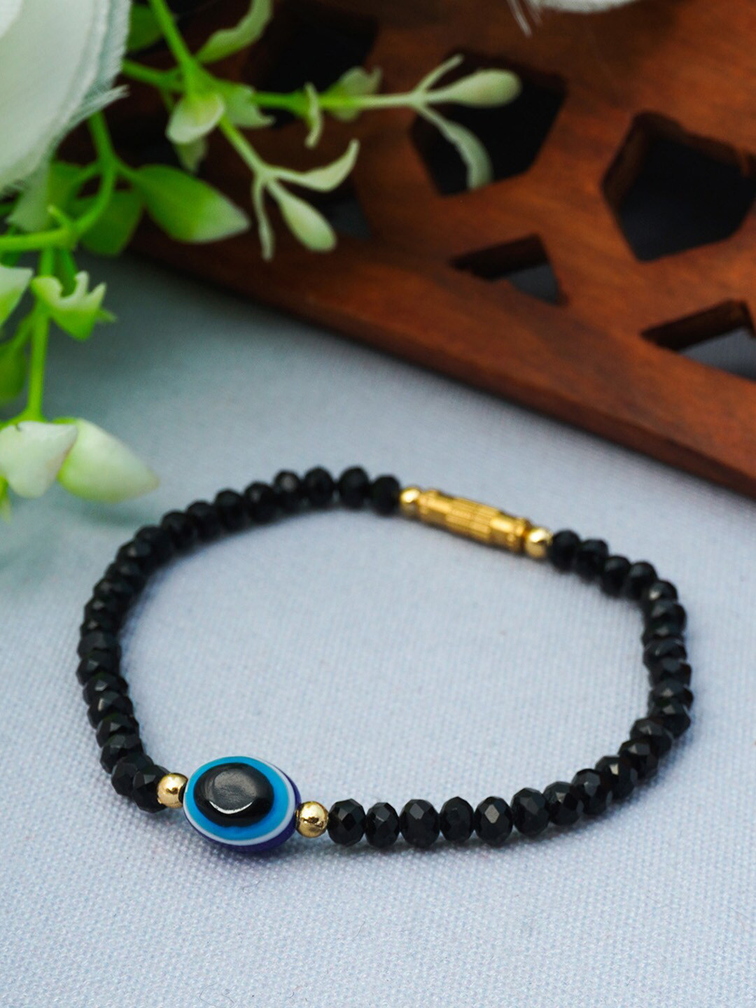 

Urmika Women Black & Blue Charm Bracelet