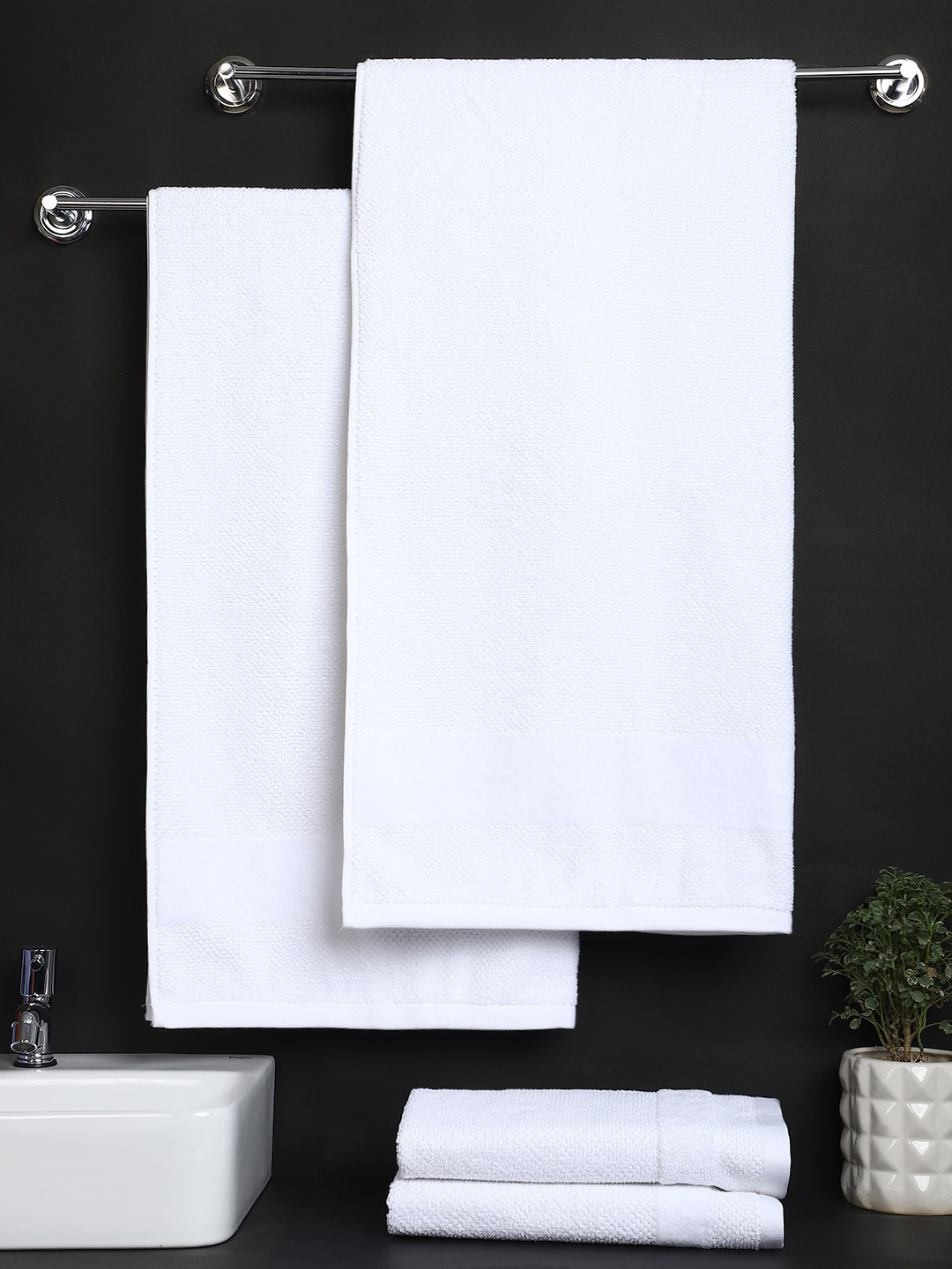 

Raymond Home Pack Of 4 White Solid Pure Cotton 600 GSM Towel Set
