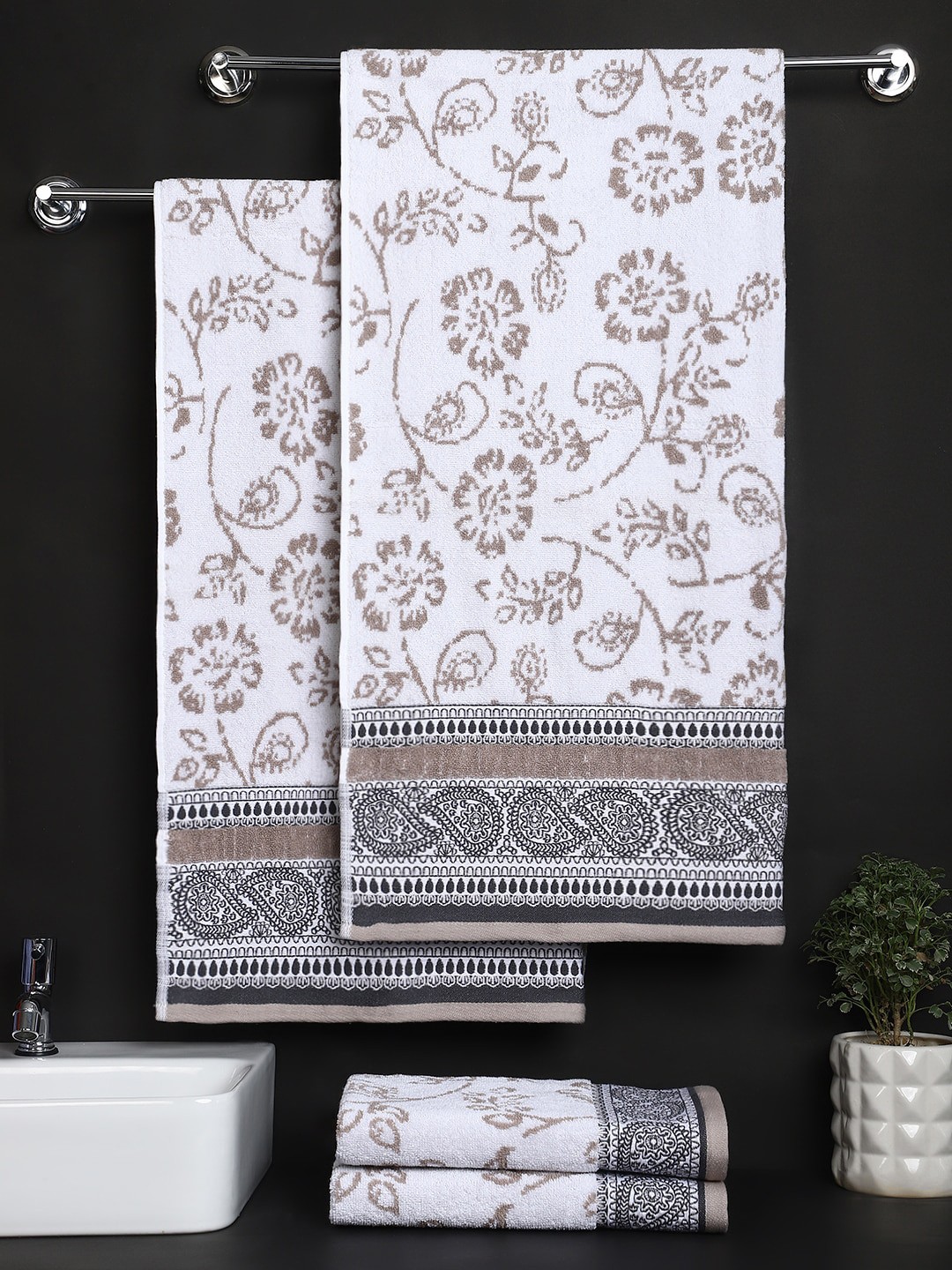 

Raymond Home Set Of 4 White Printed 550GSM Cotton Towel Set