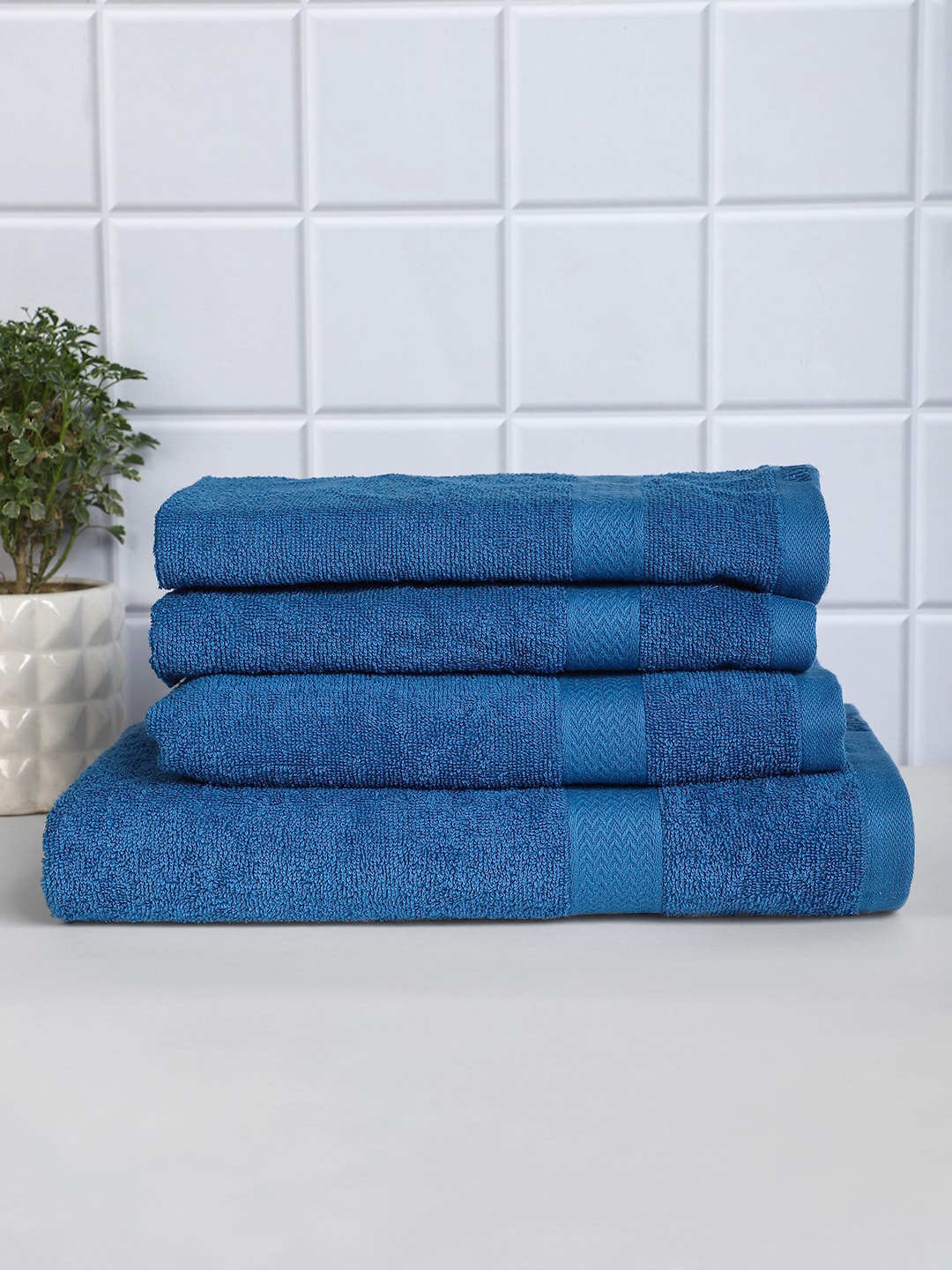

Raymond Home Set Of 4 Blue Solid 380 GSM Pure Cotton Bath & Hand Towel Set