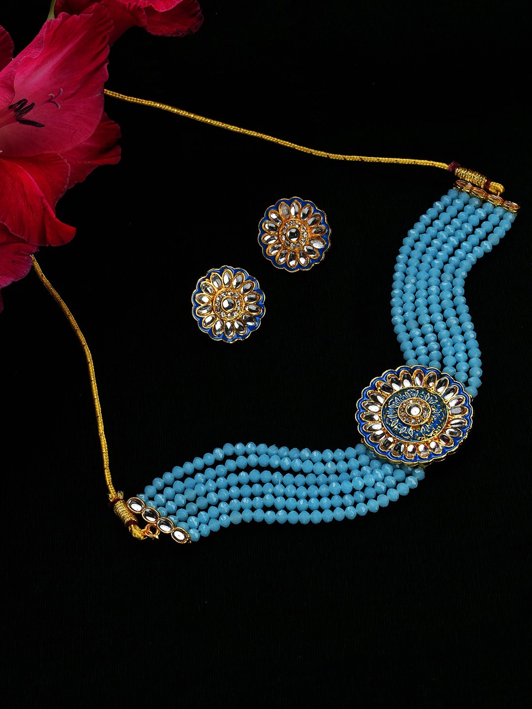 

Jazz and Sizzle Blue Gold-Plated Kundan-Studded & Beaded Jewellery Set