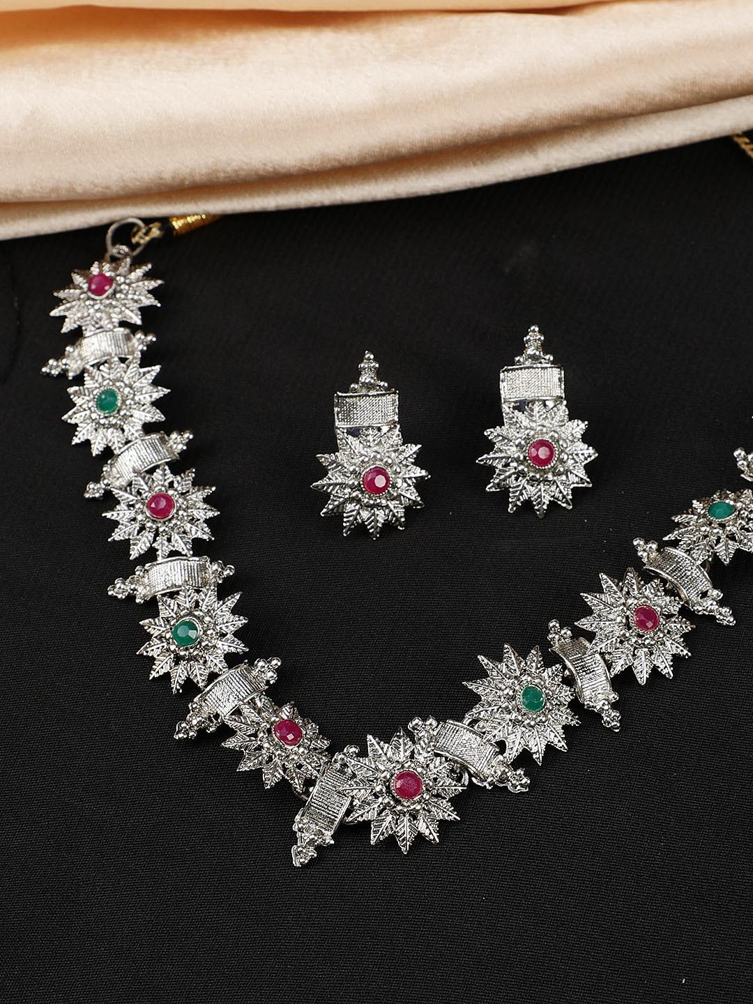 

Jazz and Sizzle Women Silver-Plated Green & Red Stone Studded Jewelry Set