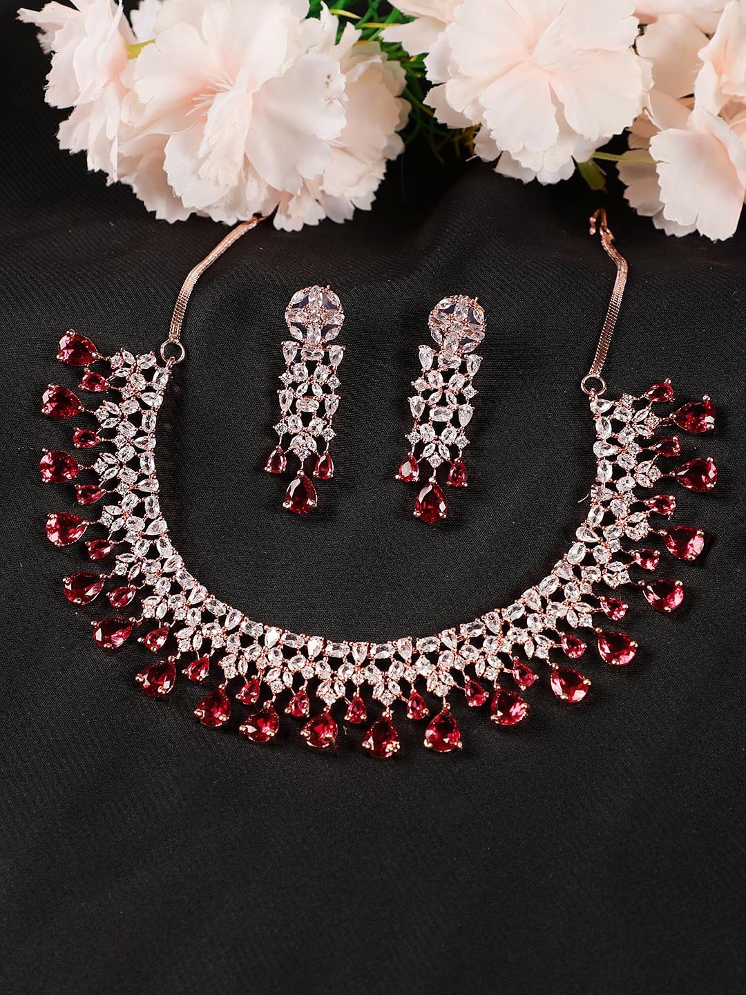 

Jazz and Sizzle Rose Gold-Plated Maroon Stone-Studded Jewellery Set