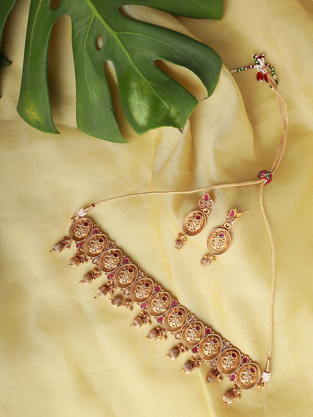 

Jazz and Sizzle Women Gold-Plated & Pink Stone-Studded Jewellery Set