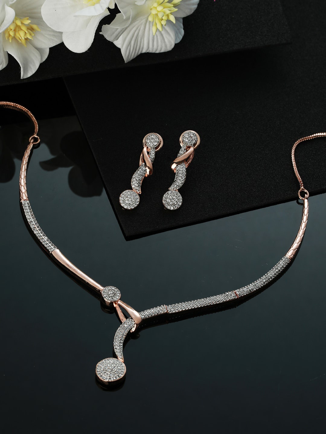 

Jazz and Sizzle Rose Gold-Plated White AD-Studded & Beaded Jewellery Set